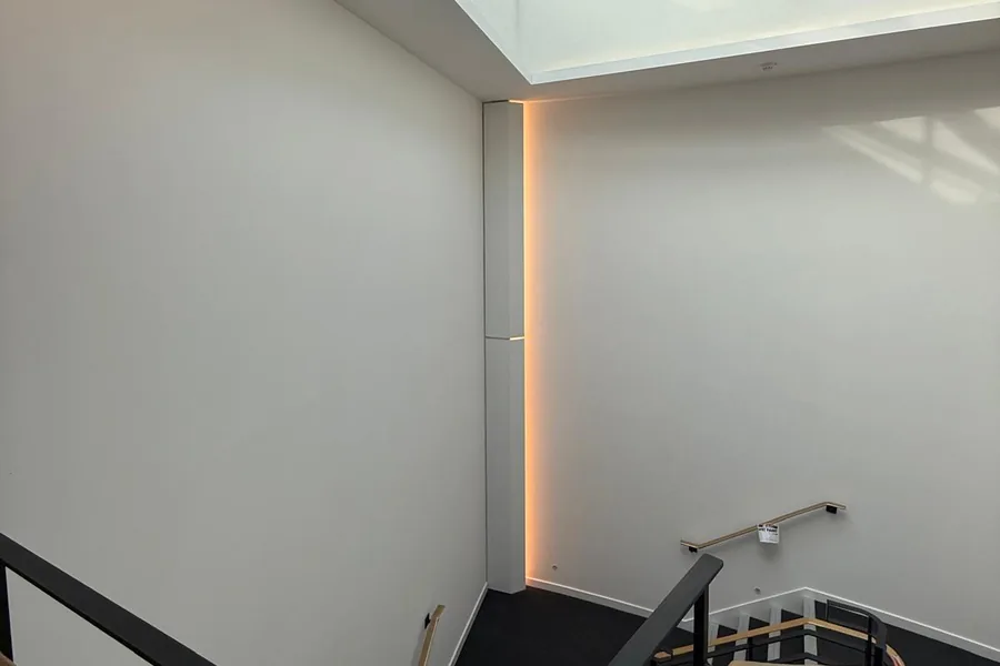 Corridor with freshly painted walls and suspended ceiling